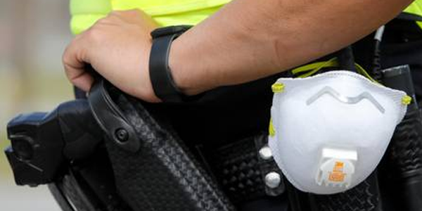 Police officer with protective mask